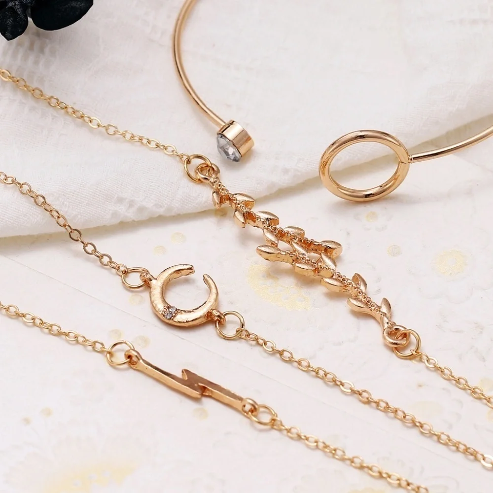 *AIRLIA* 4-Pc Gold Crescent Fashion Bracelet Set